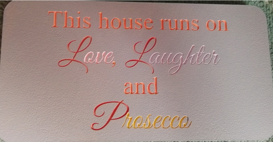 This house runs on love ,laughter and prosseco freestanding plaque