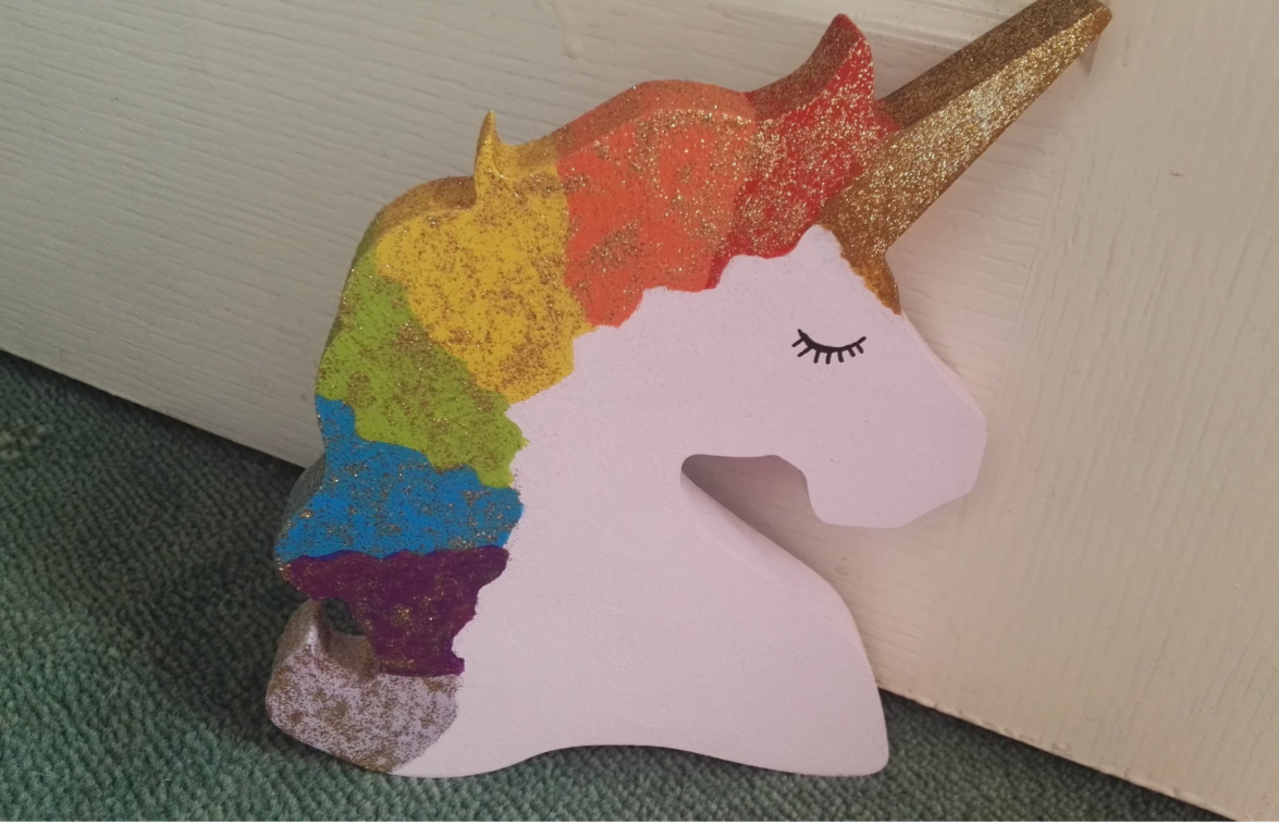 wooden freestanding unicorn with rainbow
