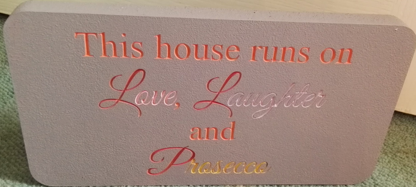 This house runs on love ,laughter and prosseco freestanding plaque